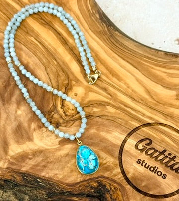 Opaque aquamarine necklace with turquoise pendant