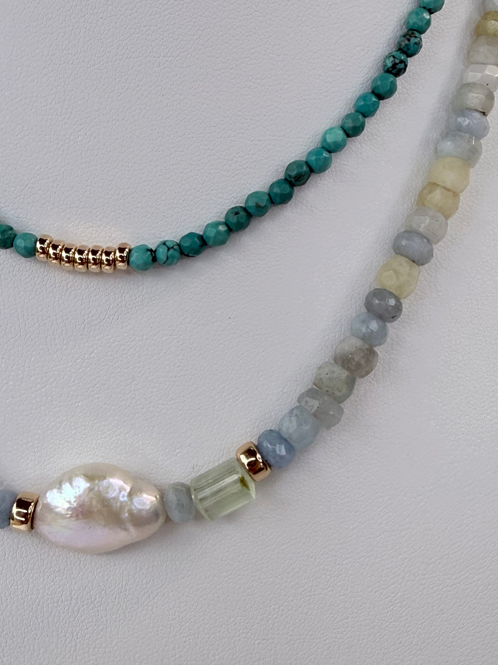 Opaque Aquamarine hand faceted necklace.
