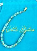 Turquoise Heishe bracelet with smooth rondelles