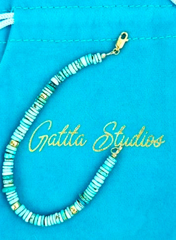 Turquoise Heishe bracelet with smooth rondelles